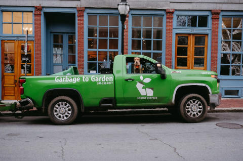 Garbage to Garden composting bucket with fresh produce and food scraps